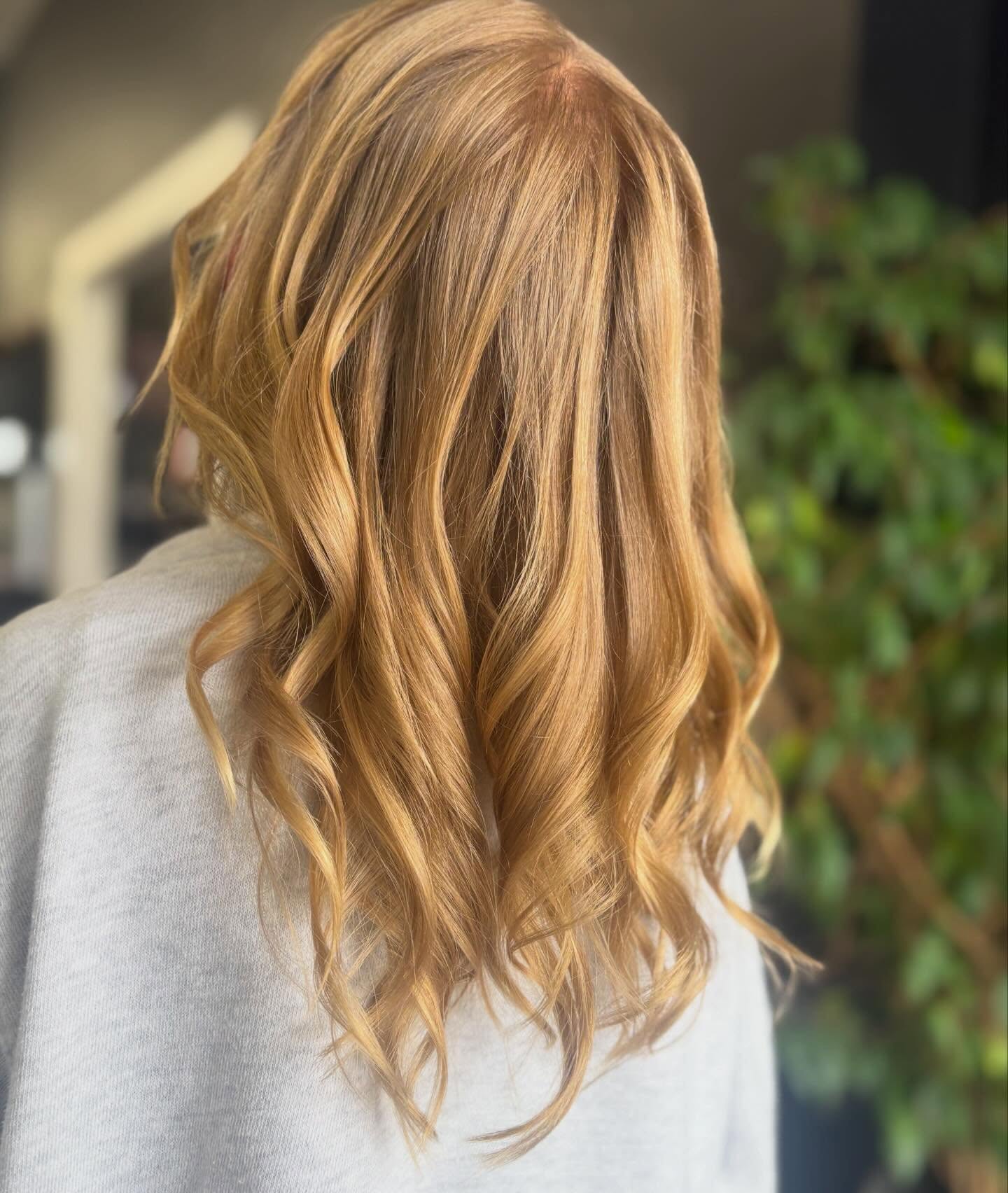 Golden blonde with soft waves
