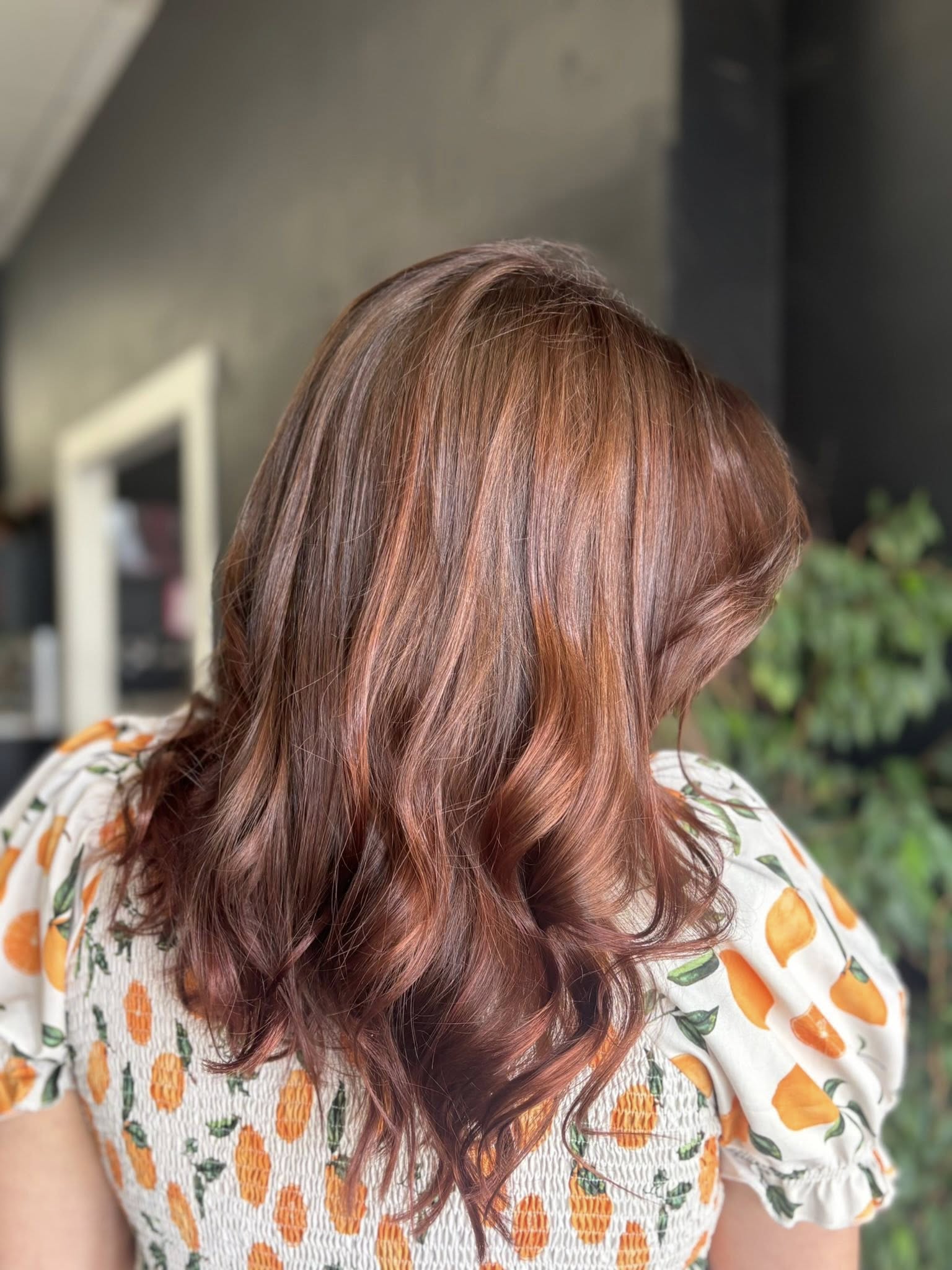 Rich red dimensional color with curls